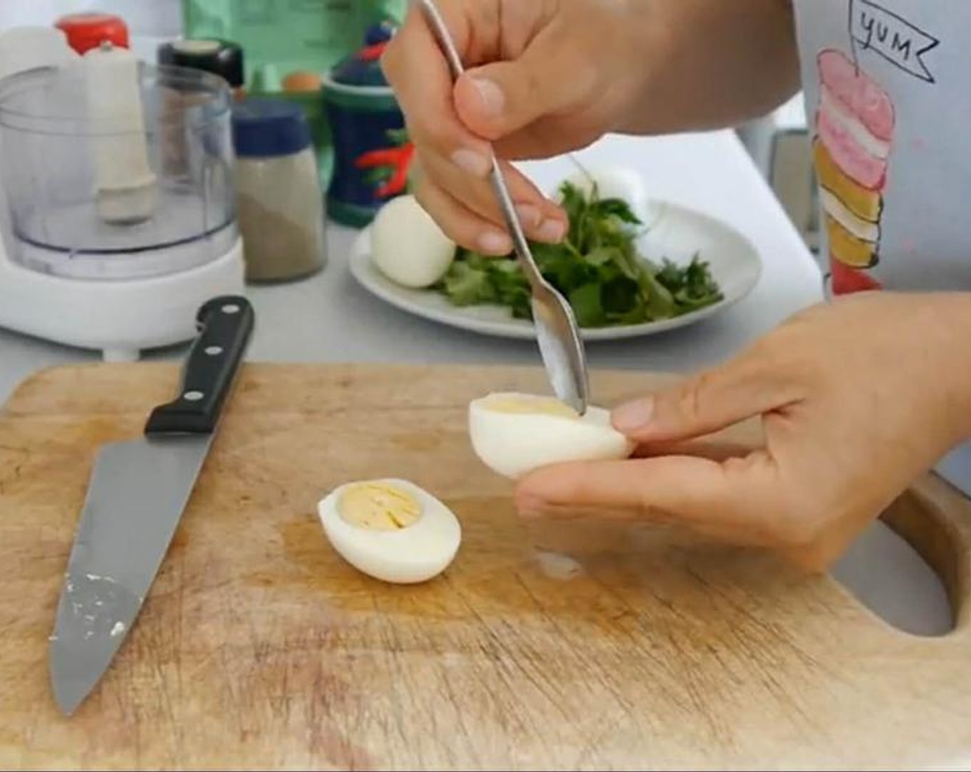 step 3 Using a teaspoon pop or scoop out each yolk carefully and set aside. Here is when having a hard yolk is helpful because they will scoop out very easily without breaking the whites.