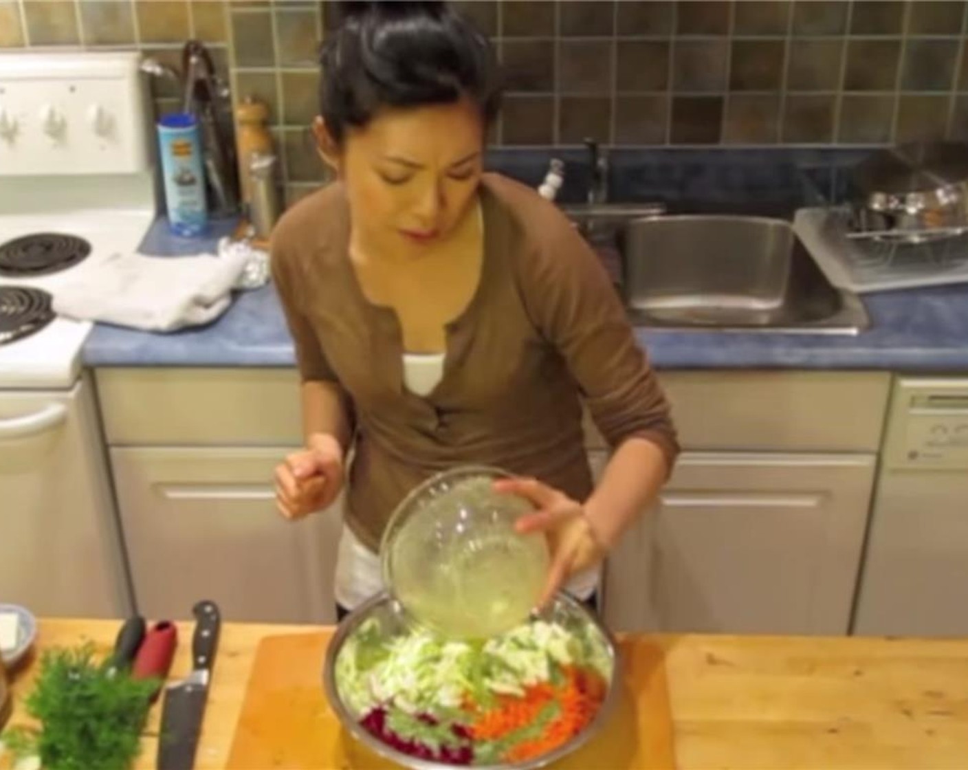 step 9 Pour dressing over grated ingredients.