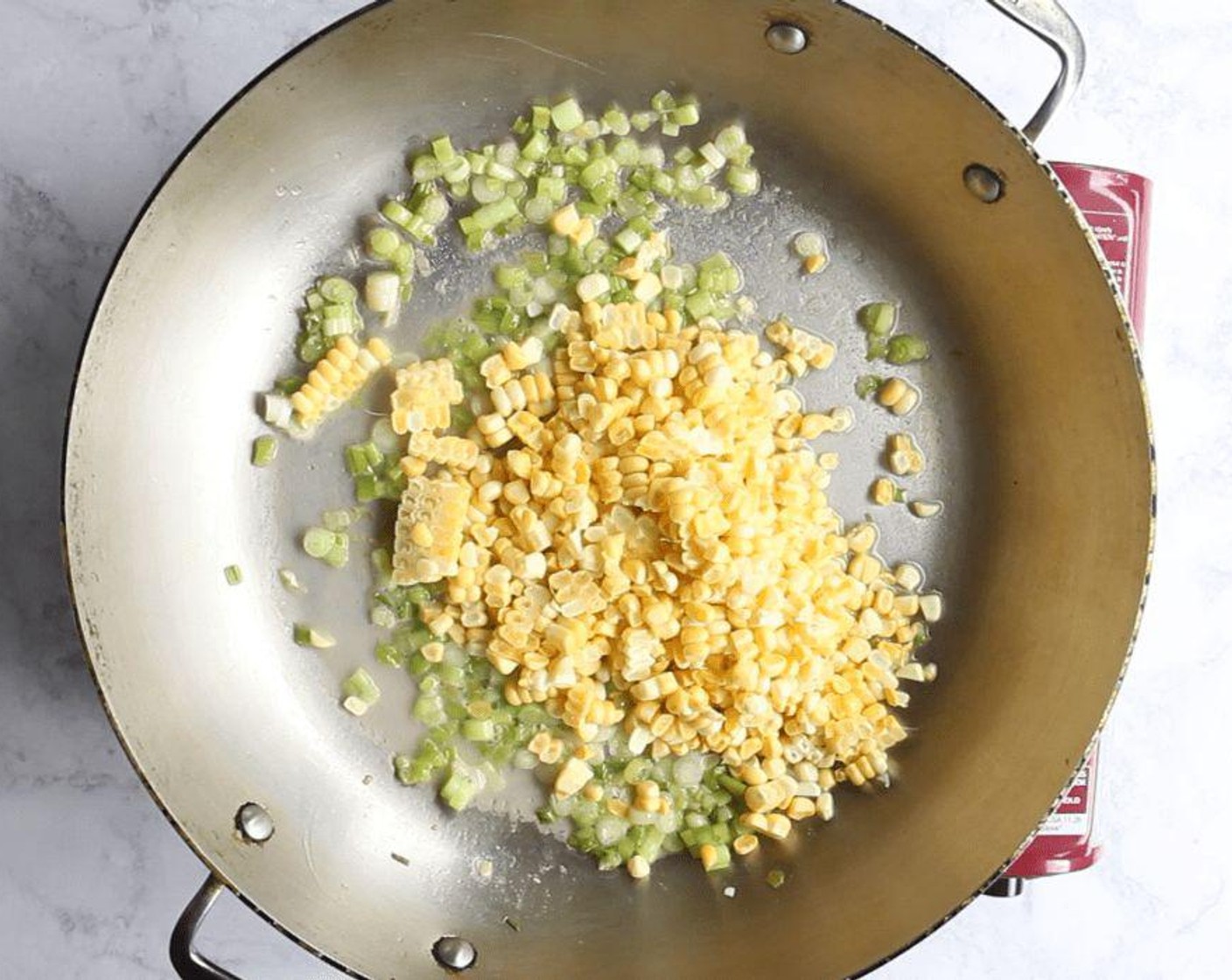 step 3 Add 1/4 cup of reserved pasta cooking liquid—dip a measuring cup into the pot if the pasta is still boiling—and all but 1/4 cup of Corn (2 ears); simmer until corn is heated through and almost tender, for 3 to 5 minutes.