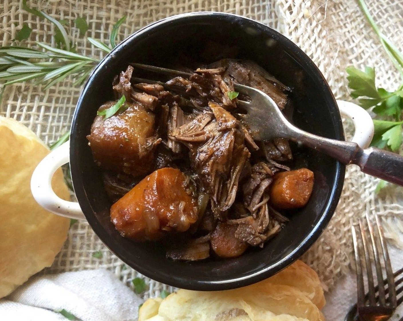 step 12 Ladle the hot stew into bowls and top each with a pastry round. Serve immediately.