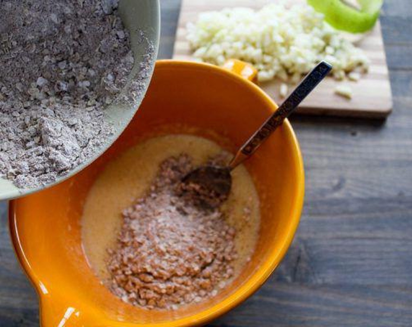 step 4 Gradually add the dry ingredients into the wet mixture. Stir until the batter is just combined, do not overstir.