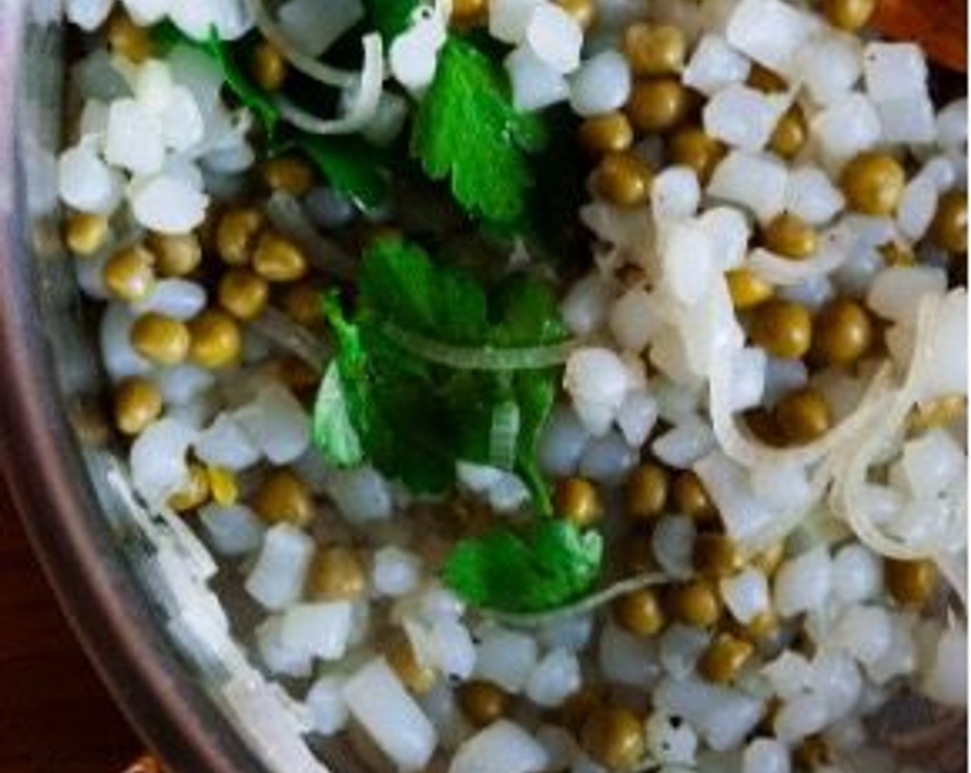 step 5 Add the Konjac Rice (1 cup) and Green Peas (1/2 cup). Season with additional salt and pepper if needed. Cook on low heat for 5-10 minutes. Remove from the stove and stir in some more fresh chopped parsley.