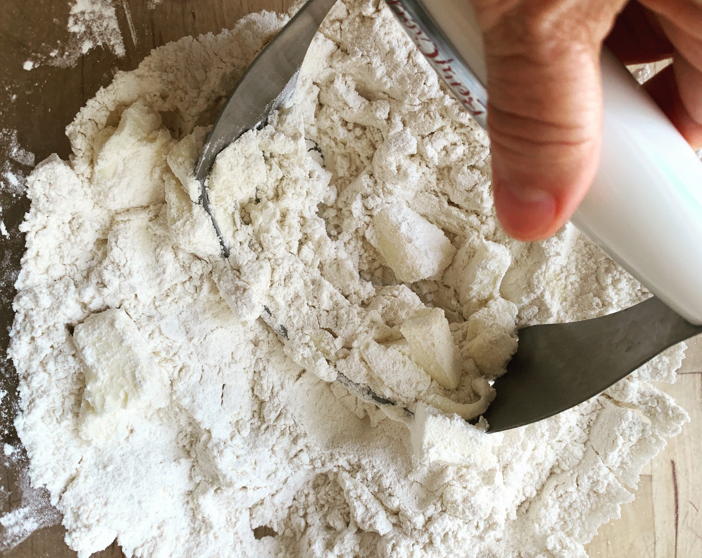 step 1 In a large bowl mix together the All-Purpose Flour (1 1/3 cups), Granulated Sugar (1/2 Tbsp), and Kosher Salt (1/2 Tbsp). With a pastry cutter, two knives, or your hands cut the Unsalted Butter (1 cup) into the flour until it resembles coarse crumbs. Add the Water (3 Tbsp) one tablespoon at a time until the dough comes together but is not sticky.