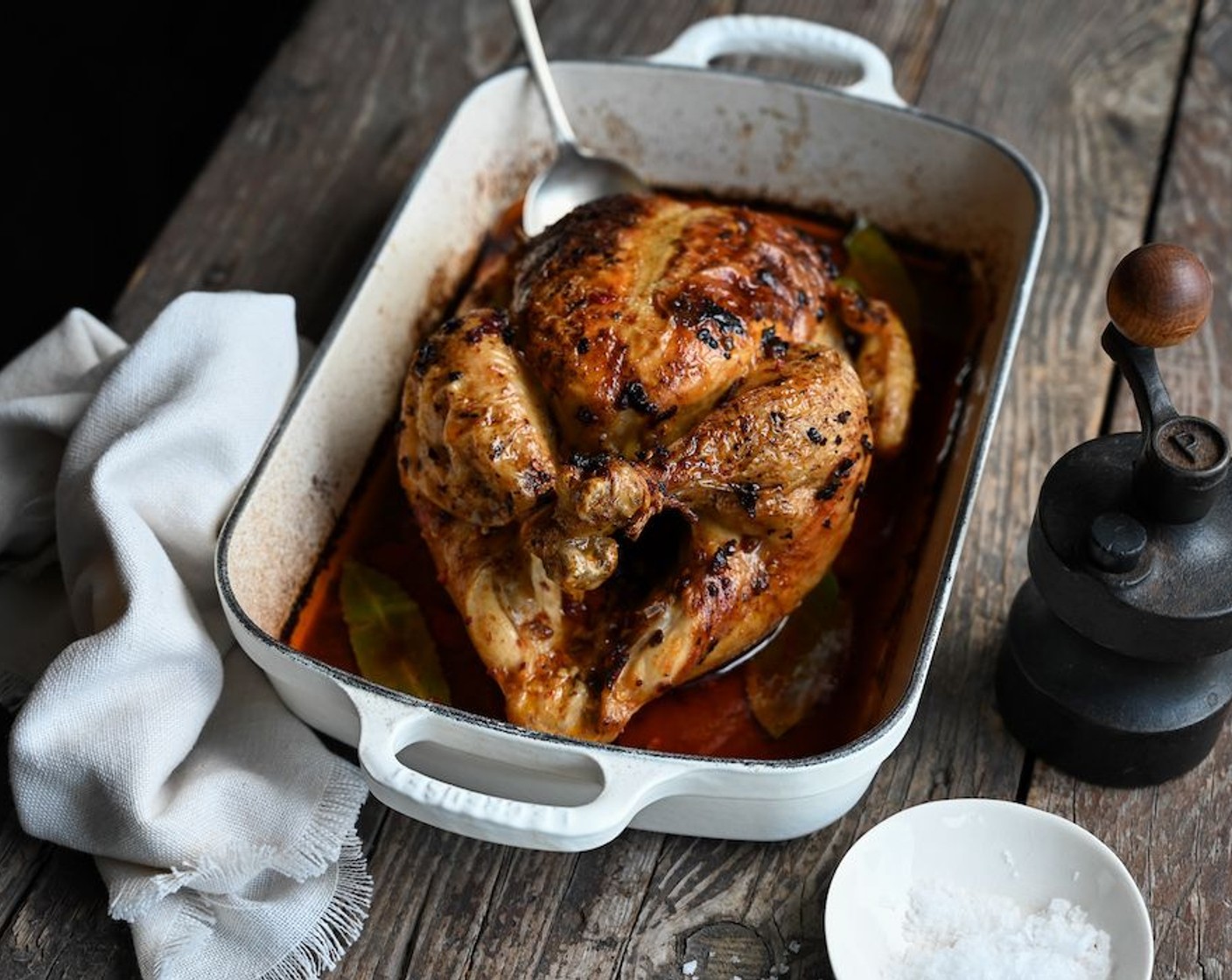 step 7 When the chicken is ready, the skin should be golden and crispy and the liquid in the bottom of the roaster thickened and syrupy.