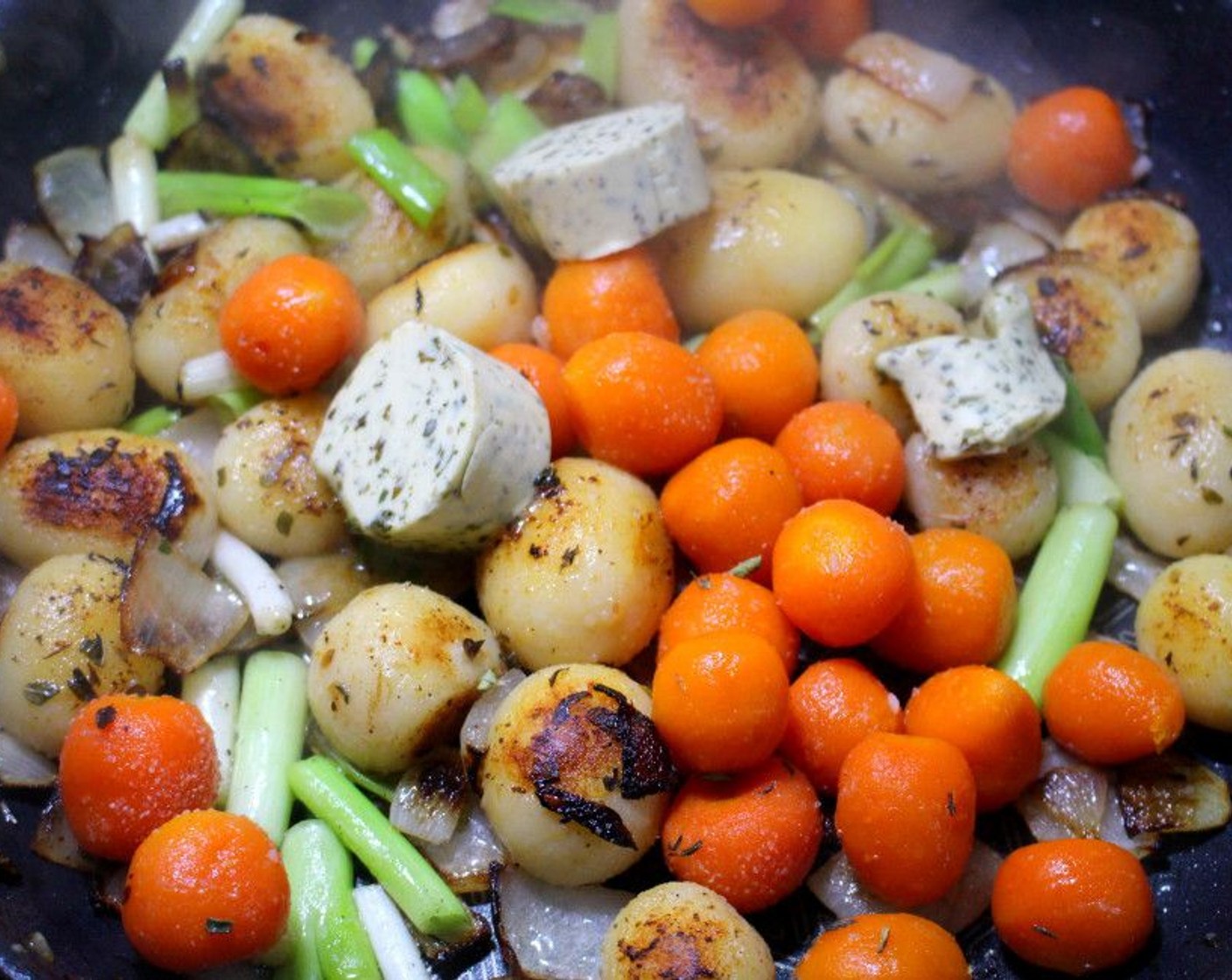 step 6 Add Carrot (1 cup) and Garlic & Herb Butter (1/4 cup). Sauté another minute and add Fresh Cilantro (2 Tbsp).