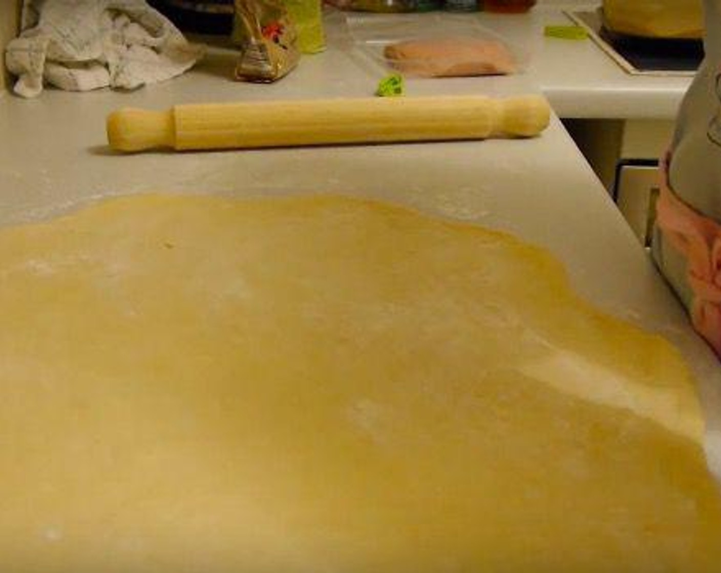 step 4 Once the dough has proved remove from the bowl and knead for another 3 minutes in a well floured surface. Extend the dough using a rolling pin until is 1/2 cm thick.