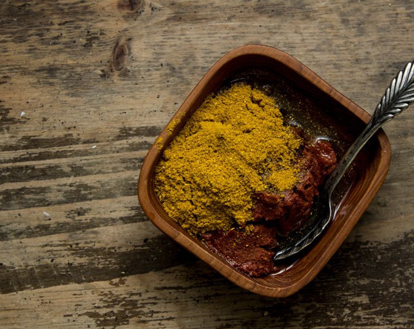step 8 Add in the spices, Kaffir Lime Leaves (3) and the khao soi curry paste and toast it for 1-2 minutes.