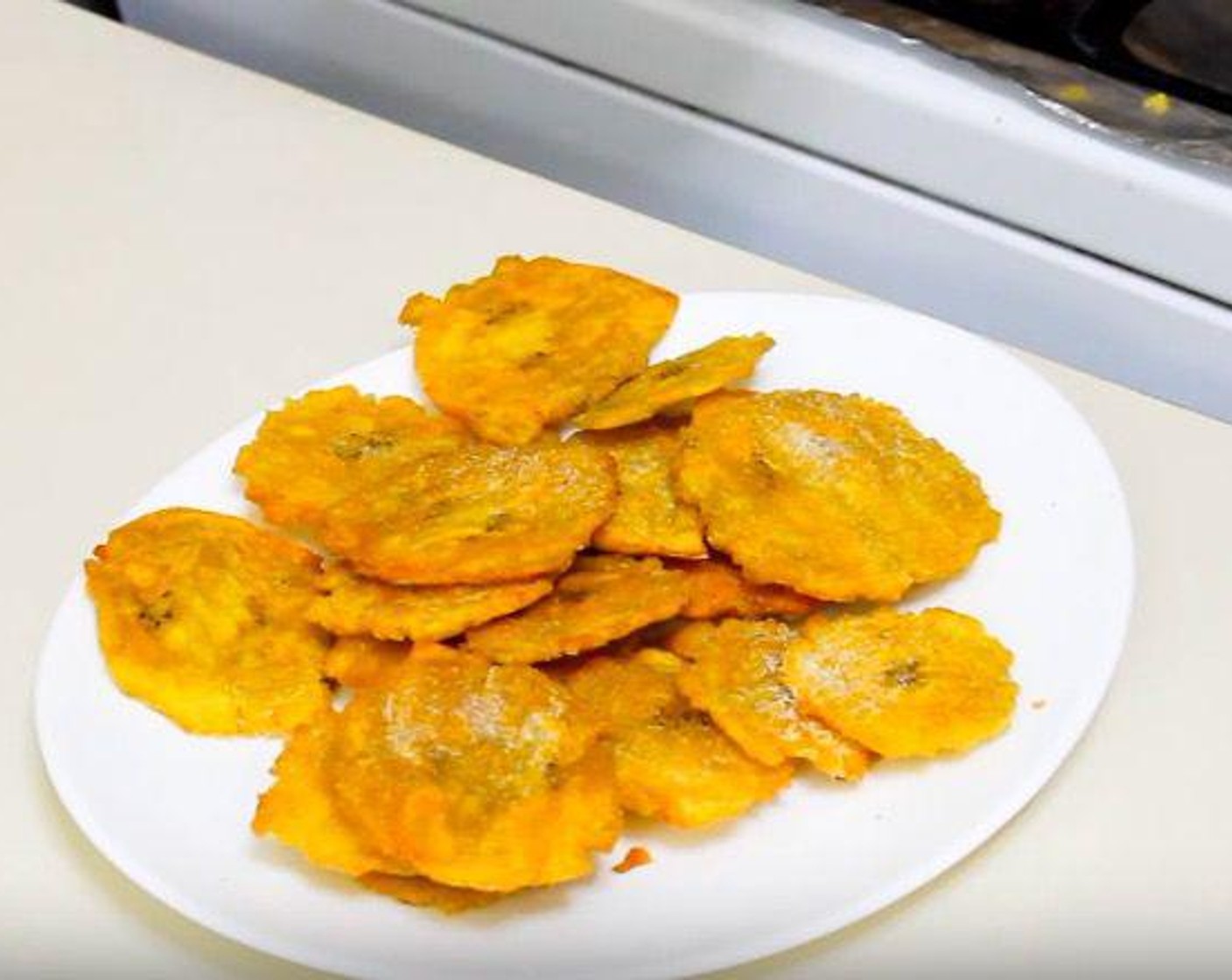 step 5 Transfer finished plantain slices to a serving platter and sprinkle with Salt (to taste) and Ground Black Pepper (to taste). Serve immediately and enjoy!