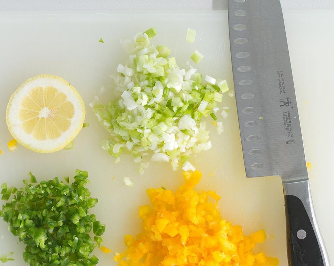 step 1 Finely chop the Yellow Bell Pepper (1/4 cup). Finely chop the Jalapeño Pepper (1). Finely chop the Scallion (1 bunch).