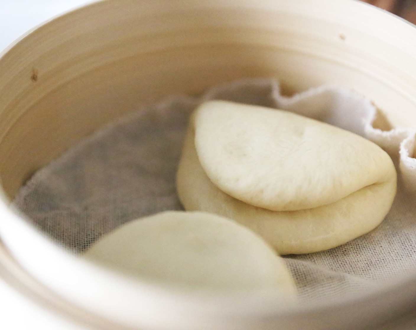 step 16 Heat a large steamer over a medium-high heat. Steam the buns for 8 mins until puffed up. Depending on the size of your steamer, you might have to do this in batches.