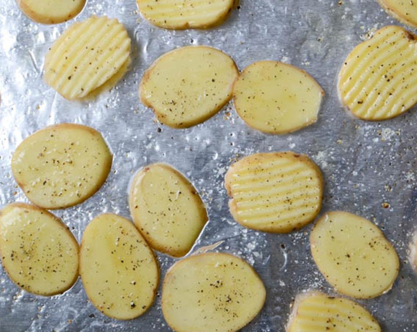 step 4 Place potato slices in a single layer on a baking sheet and bake for 10-12 minutes.