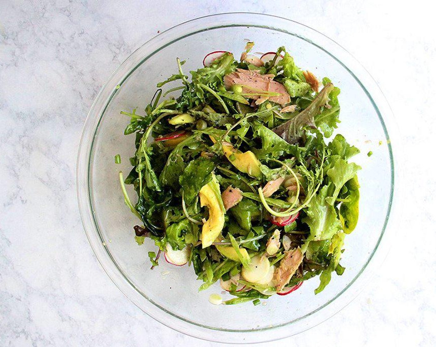 step 2 Place the Lettuce (to taste), Radish (1 bunch), Turnip (1), Snow Peas (1 bunch), Scallion (1 bunch), and Canned Tuna (1 can) in a large bowl. Pour over vinaigrette to taste. Season with Freshly Ground Black Pepper (1 dash) to taste. Toss gently and serve.
