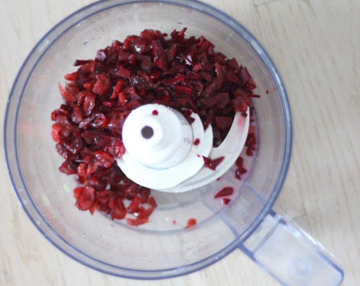 step 3 Put the chopped beet pieces and the chopped dried cranberries in a food processor or blender. Add the Juice from Lime (1) and Water (1 cup), then start blending! Blend for about 1 minute.