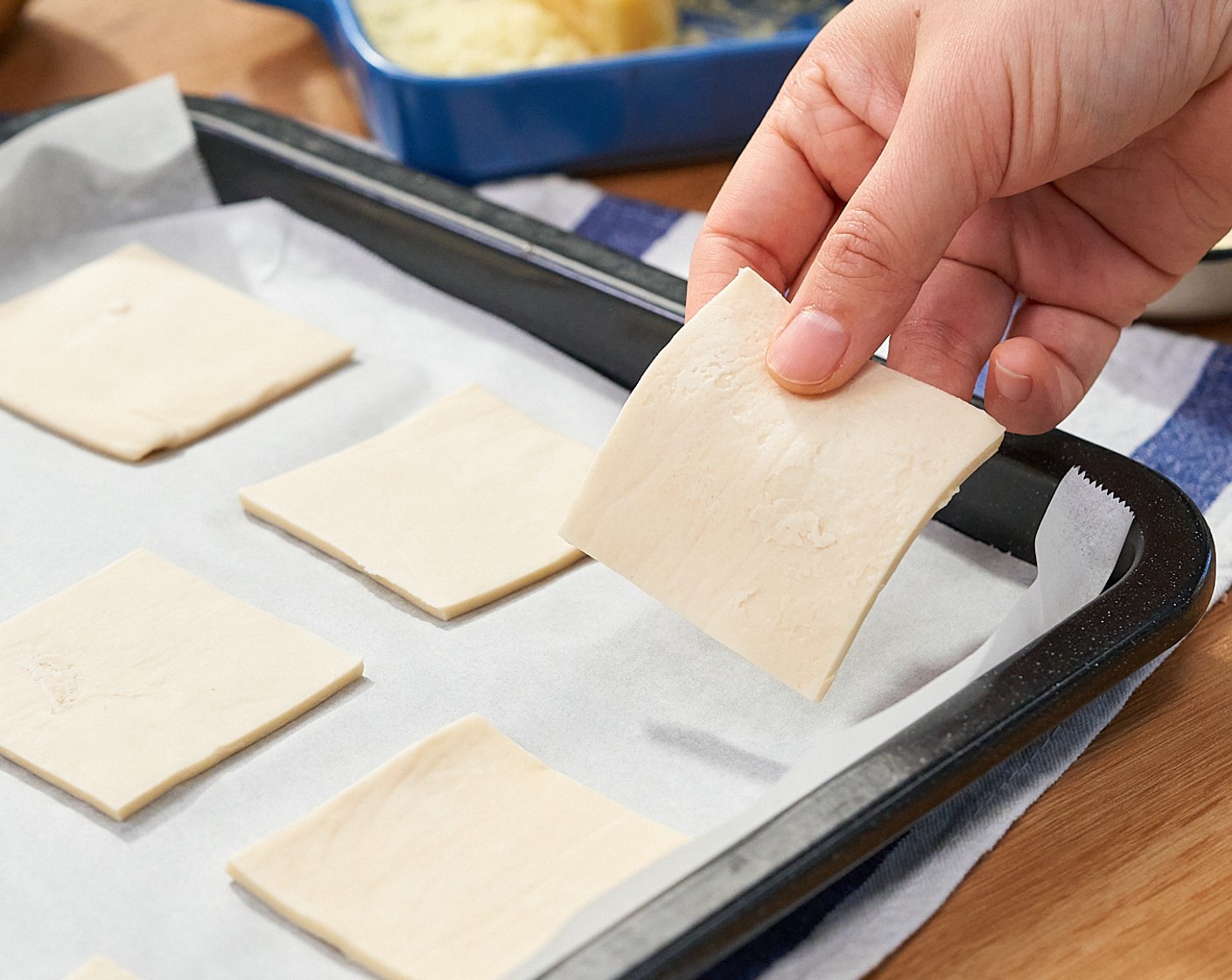 step 4 Arrange the puff pastry on the parchment paper-lined baking sheet.