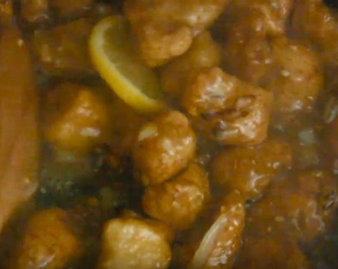step 9 When sauce begins to thicken, return chicken to the pan. Stir well until chicken is coated.