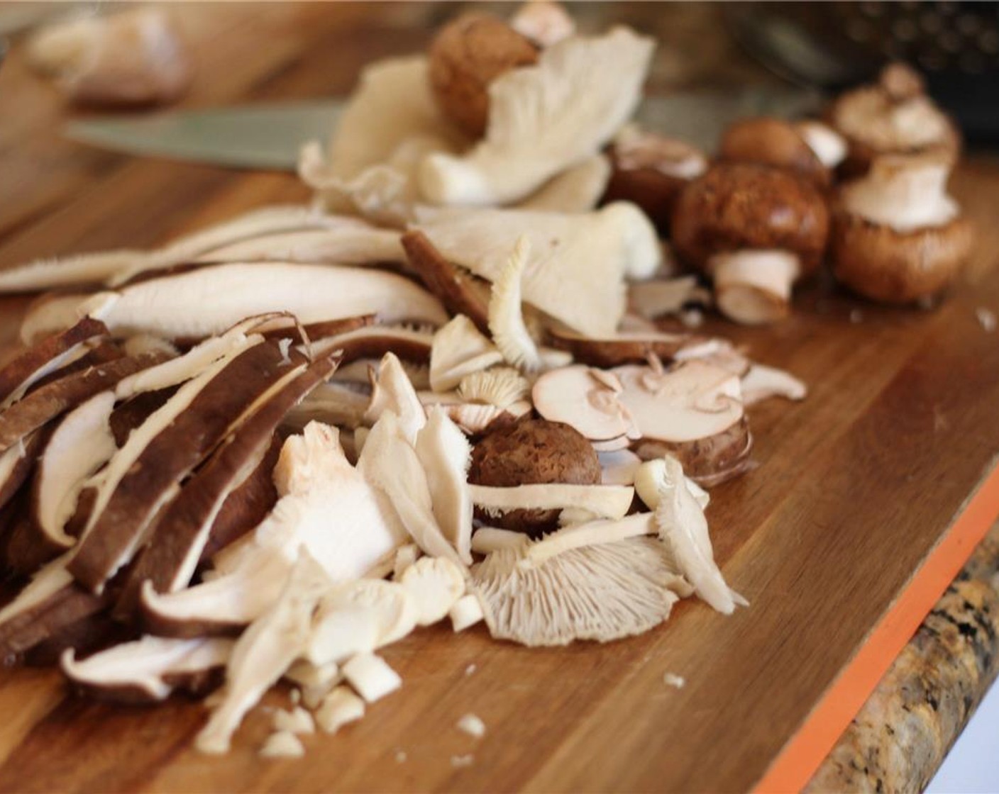 step 2 Slice the Shiitake Mushroom (2/3 cup), Porcini Mushrooms (3/4 cup), Cremini Mushroom (1/2 cup), and Oyster Mushroom (1/2 cup), and set aside.