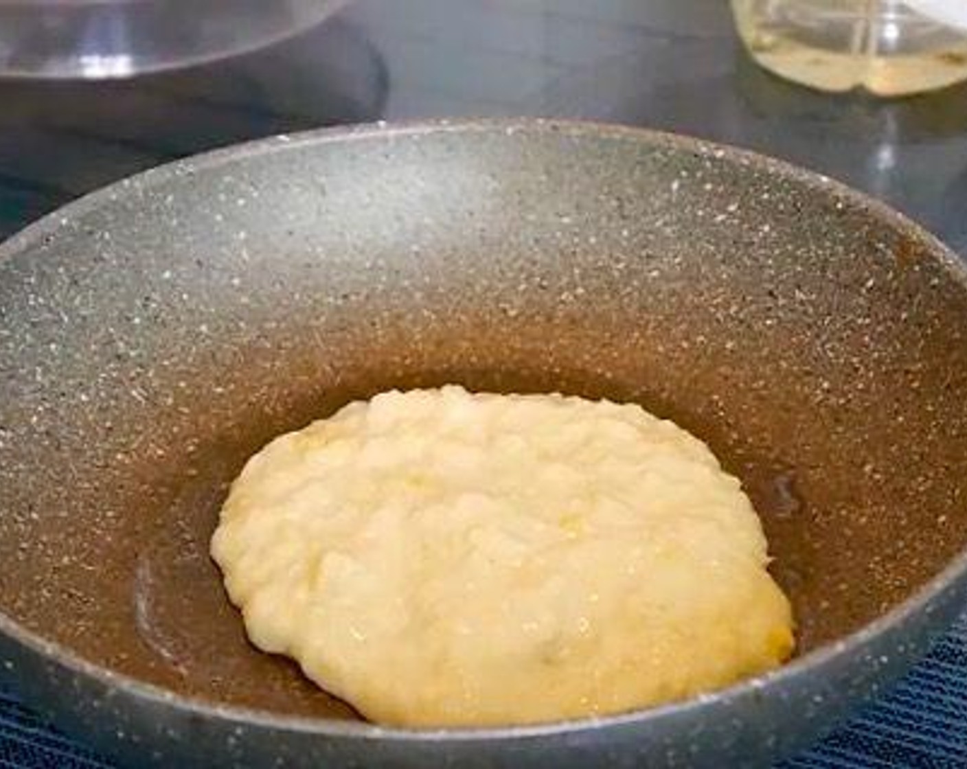 step 2 In a pan with a dash of oil, pour two teaspoonful of mixture at a time.  Cook until brown for both sides. Keep on doing with the rest. Serve and enjoy!