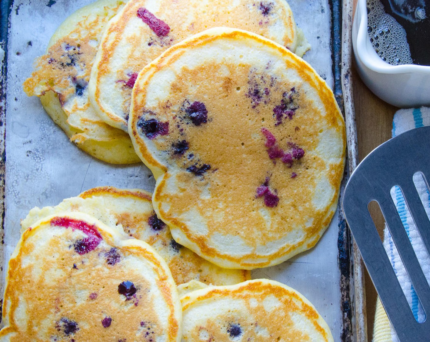 step 7 Transfer pancakes to a baking sheet and keep them warm in the oven while you finish off the rest of the pancakes.