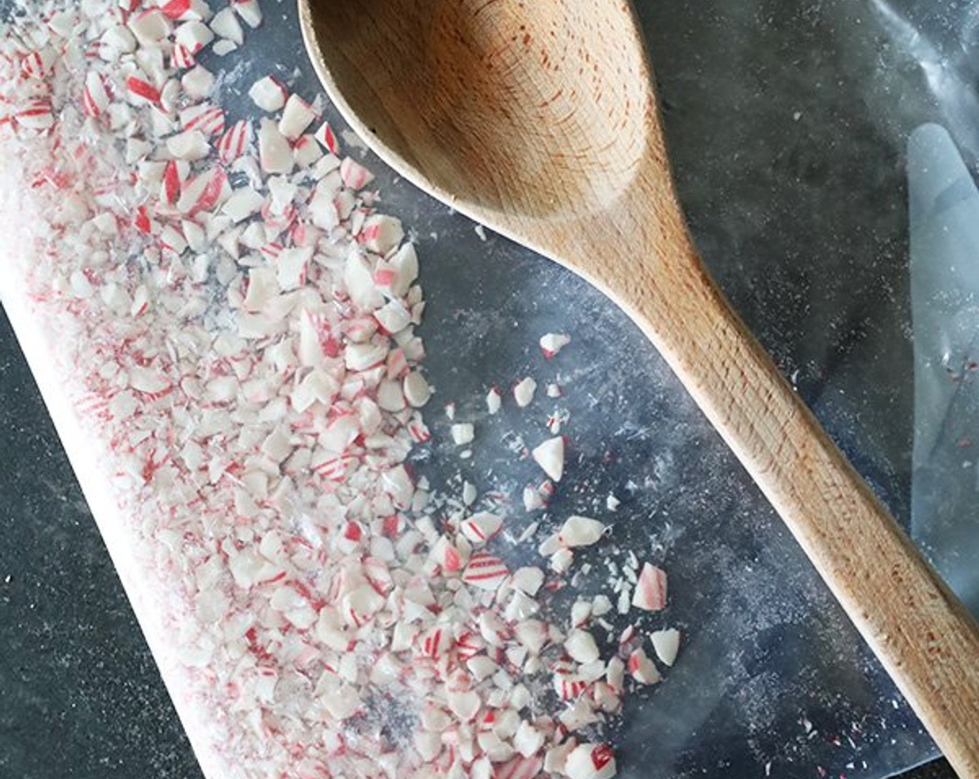 step 2 Place Candy Canes (4) in a Ziplock bag and crush them with a wooden spoon or a meat mallet.