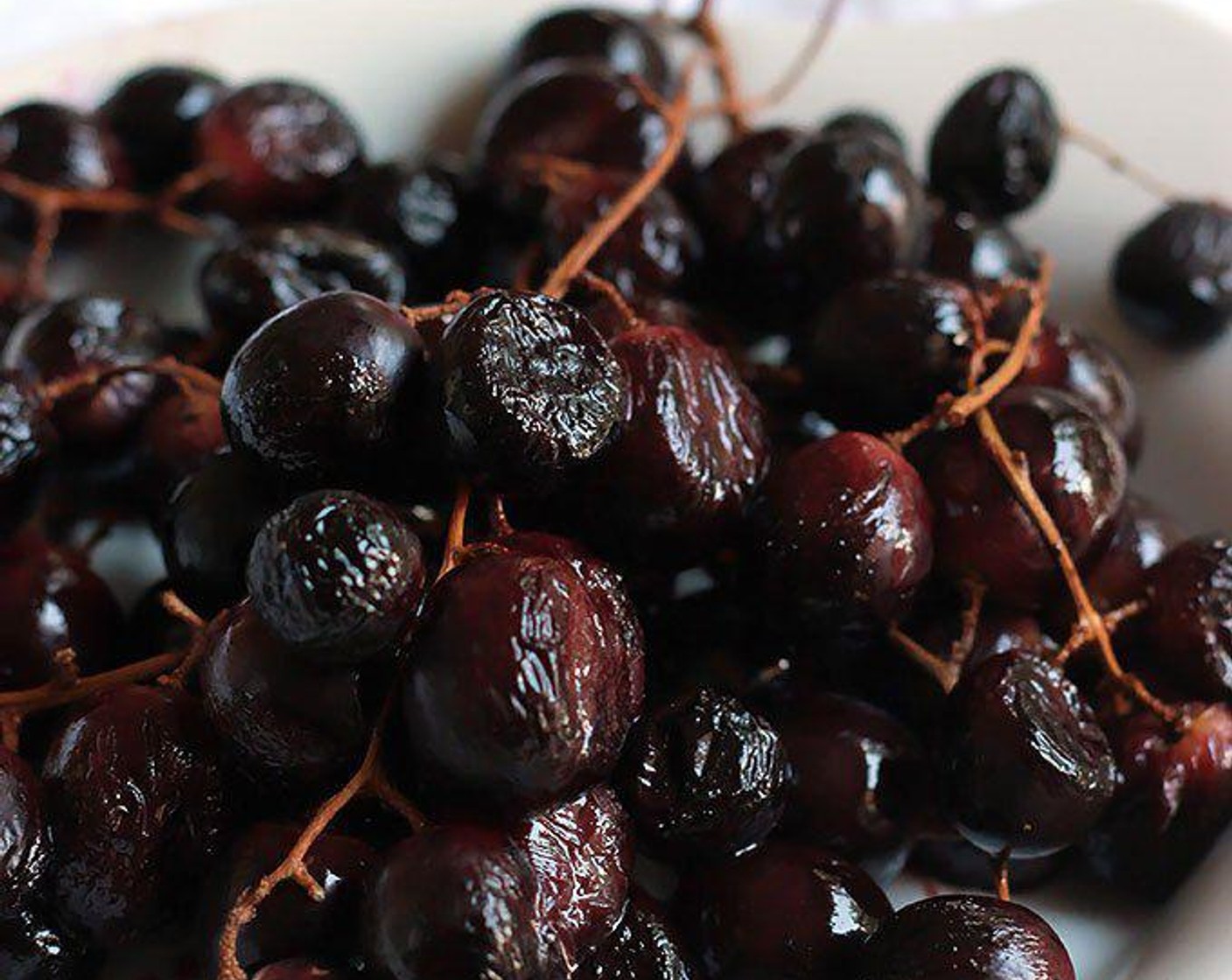 step 2 Place washed Grapes (9 cups) on a shallow baking pan and drizzle with a small amount of Olive Oil (as needed). Roast for 30 minutes.