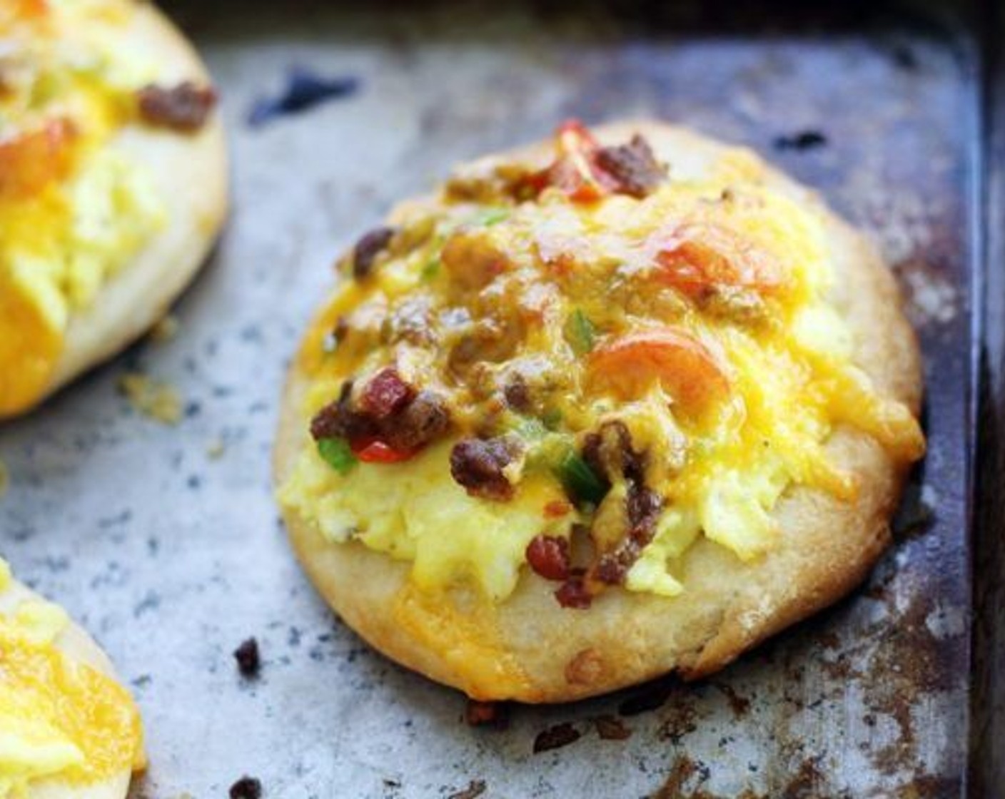 step 5 Bake for about 12 minutes or until the biscuit pizza crusts are golden and the cheese is melted.