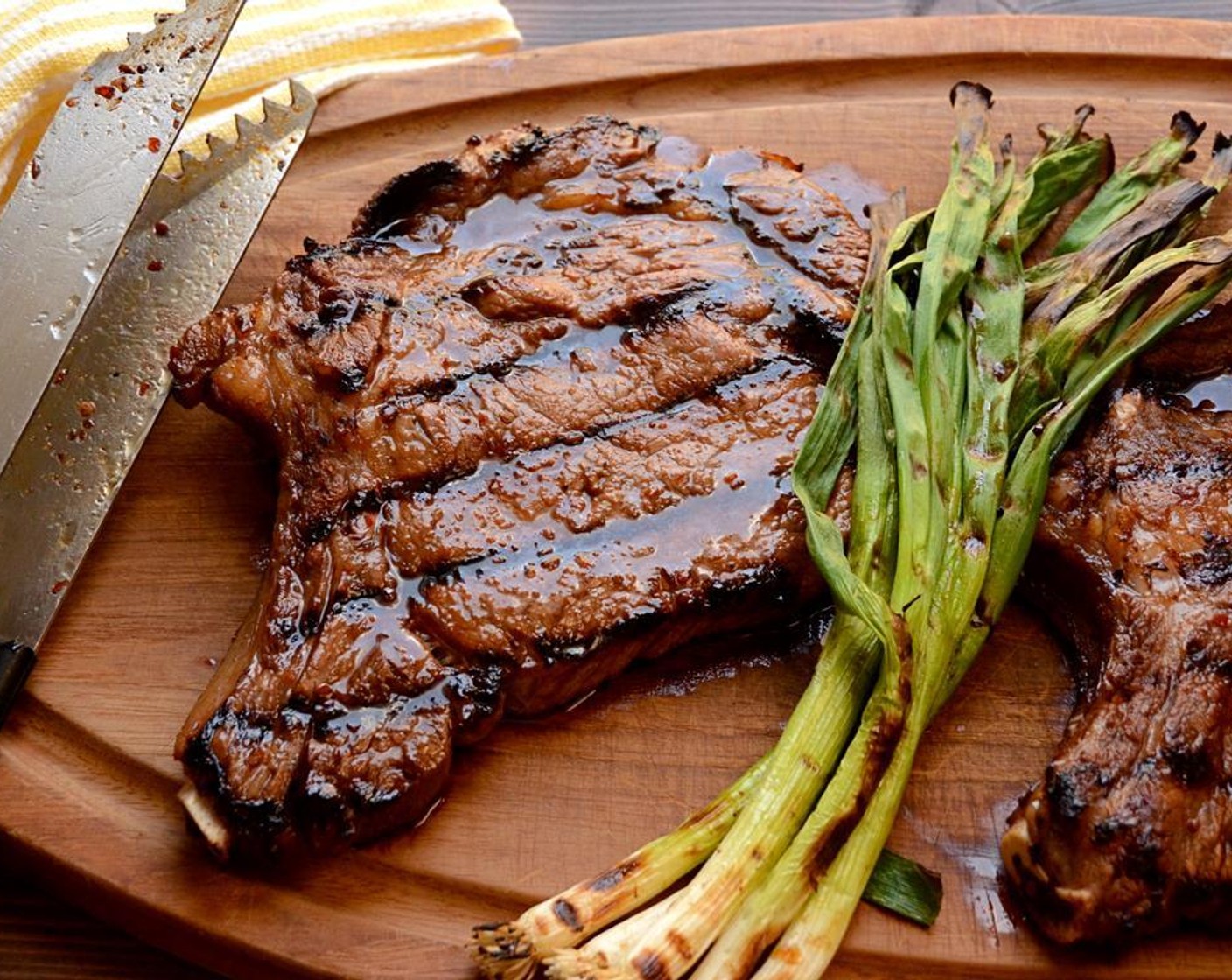 step 14 Transfer the steak and scallions to a cutting board and let the meat rest for 5 minutes before cutting.