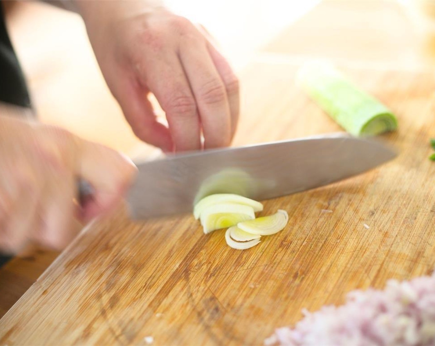 step 1 Mince the Garlic (4 cloves) and Shallot (1/2 cup) and set aside. Slice Leek (1 cup) in half lengthwise, then place flat end of leeks on board and thinly slice across. Set aside.
