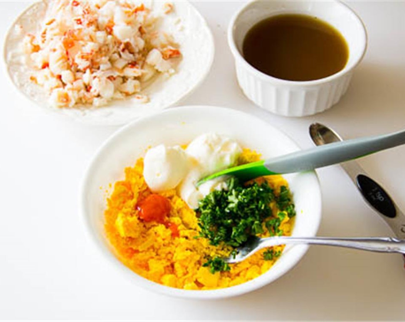 step 7 Add about 3 tablespoons of lobster broth into the mixture a tablespoon at a time until desired thickness reached.