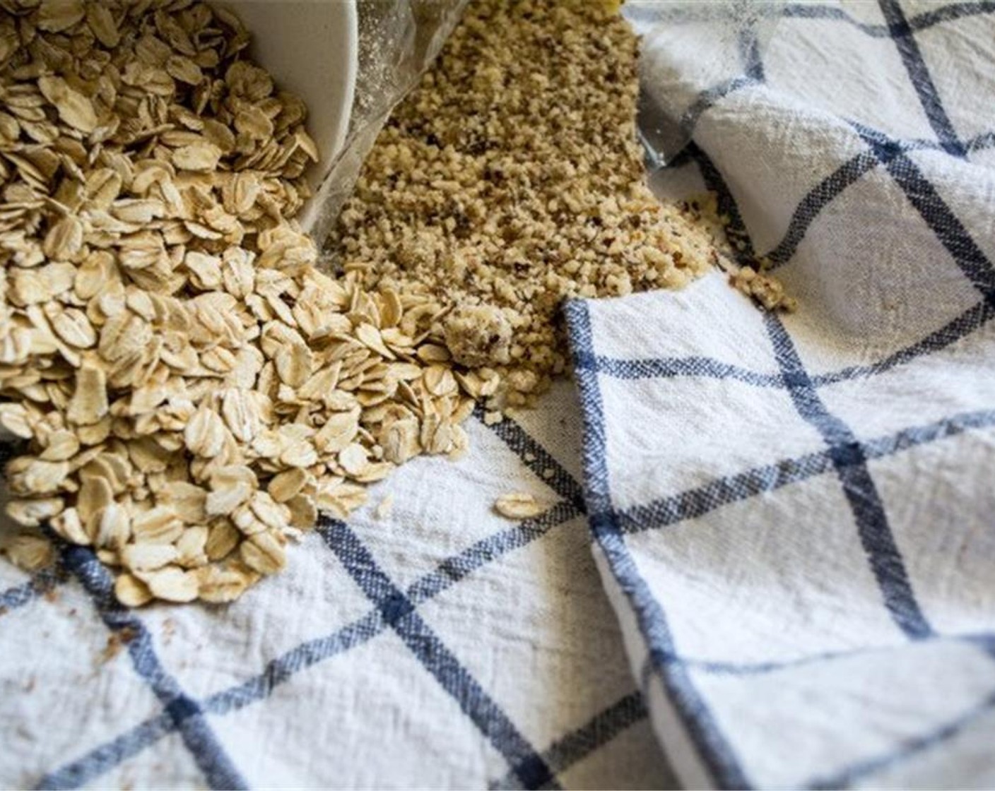 step 2 Add the Oats (1/2 cup) and half a cup of Hazelnut Meal (1/2 cup) to NutriBullet or food processor and blend for 5-10 seconds until a fine flour-like consistency is reached. Set aside.