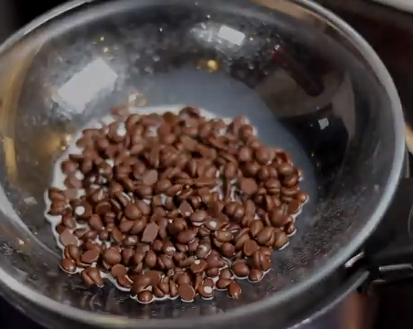 step 4 To make the fudge, melt Semi-Sweet Mini Chocolate Chips (1/2 cup) and Milk (1 1/4 cups) in a double boiler or microwave oven and stir to combine.