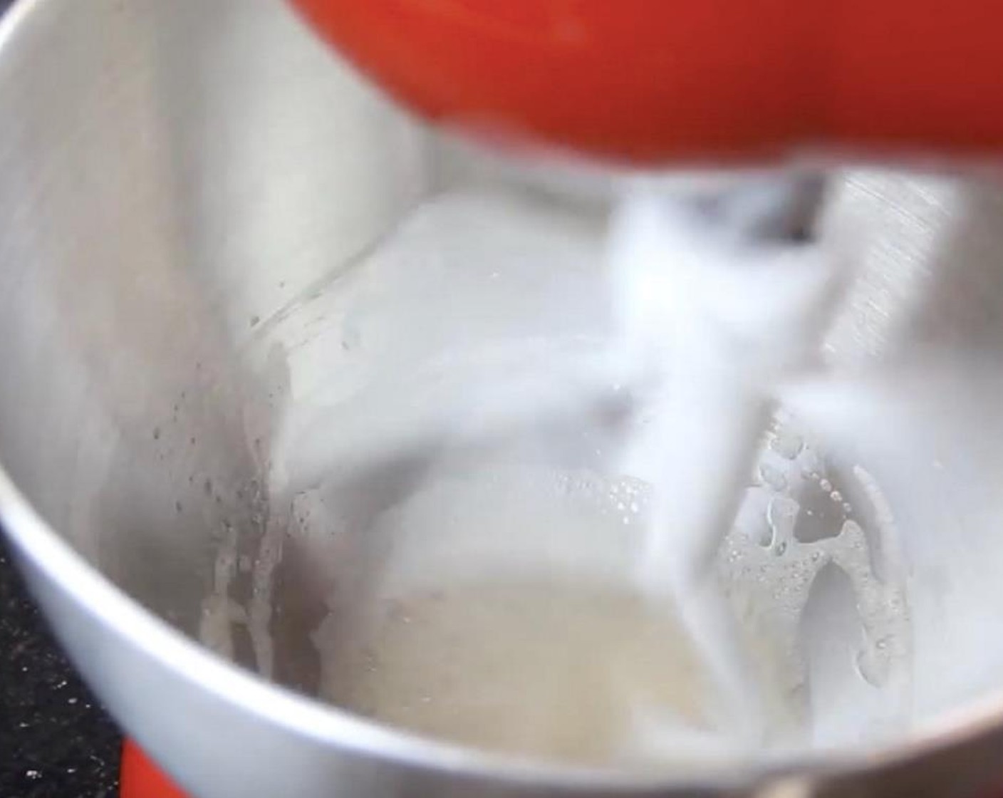 step 11 Make the royal icing. Beat Eggland's Best Classic Egg (1) white, Vanilla Extract (1/2 tsp), and Salt (1 tsp) together until frothy.