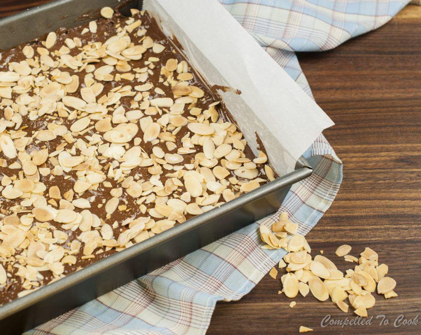 step 5 Pour over krispie squares and spread out evenly. Sprinkle evenly with Toasted Sliced Almonds (1/2 cup). Allow to cool to room temperature prior to cutting.