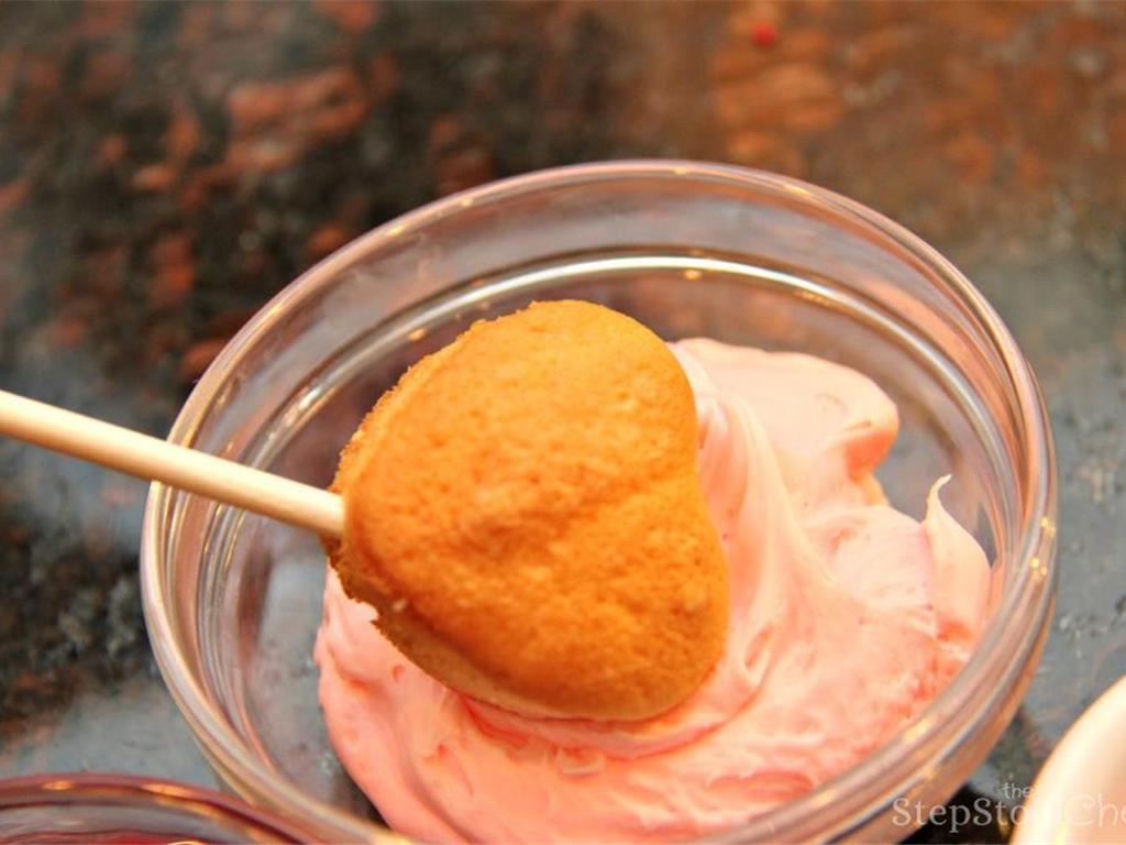 Step 4 of Cupcake Fondue Recipe: Then start the FUNdue by dipping the cupcakes in your favorite frosting.