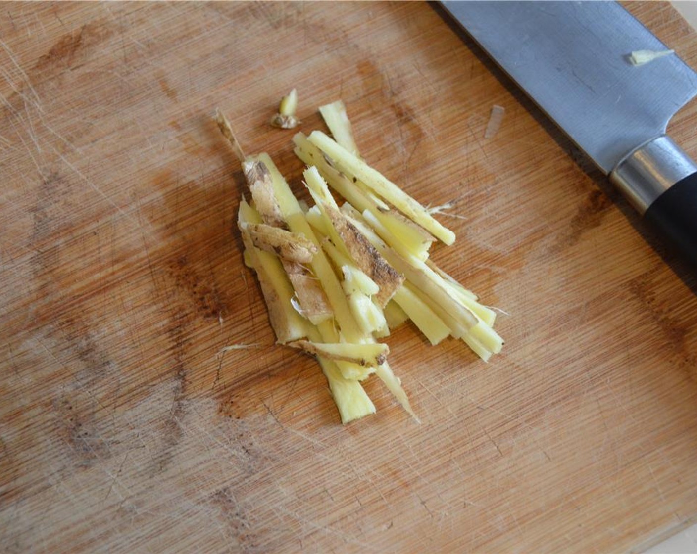 step 3 Peel and thinly slice the Fresh Ginger (1 in) and Garlic (3 cloves).