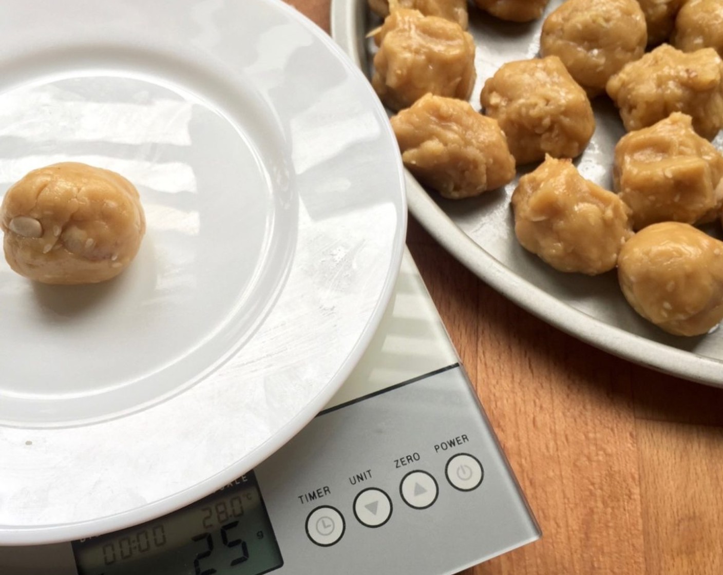 step 10 Divide dough into small portions according to the size of the mould used. For my mould, I divide the mooncake dough into 25g each and roll into balls.