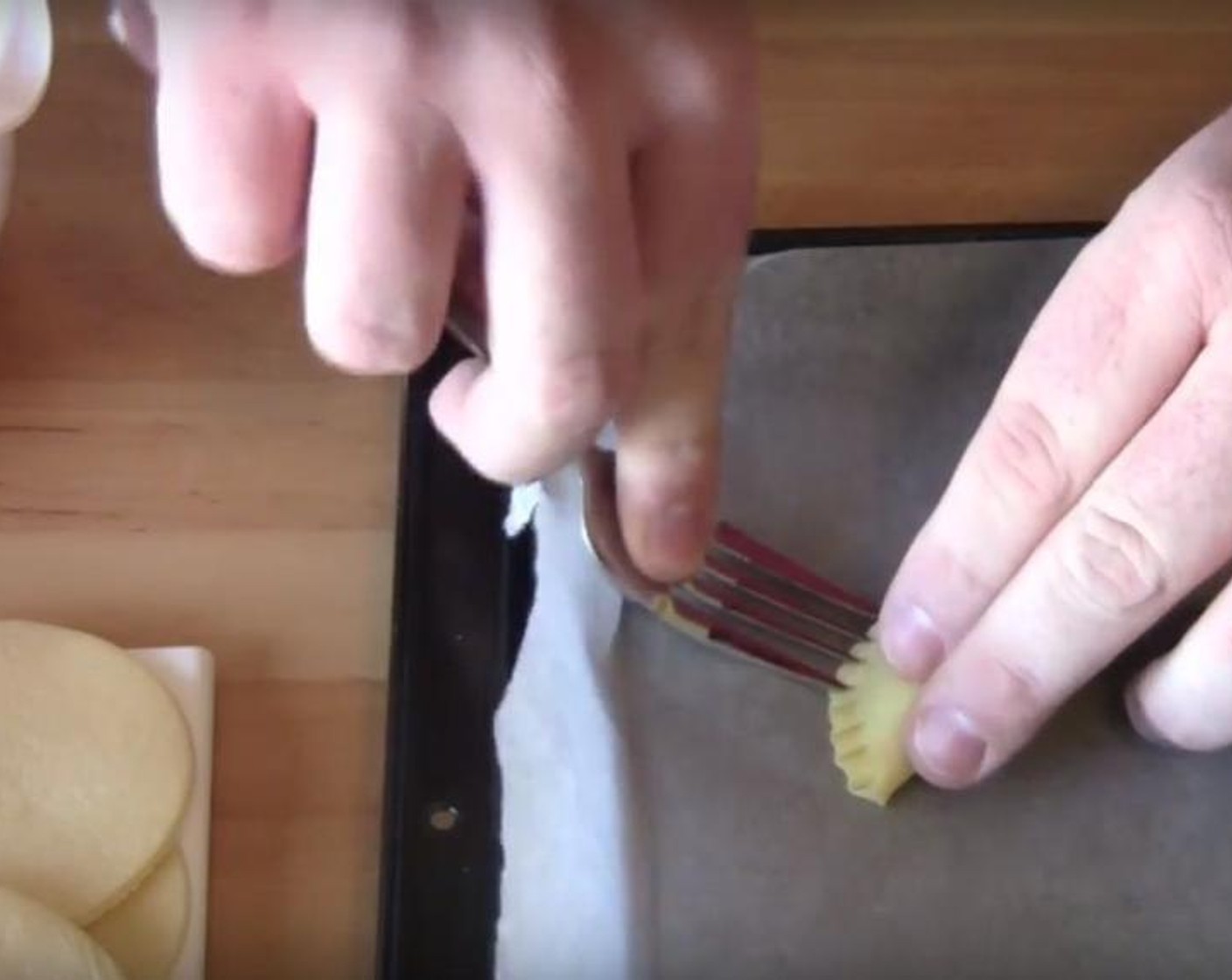 step 2 Use a large cookie cutter to cut circles into the Frozen Shortcrust Pastry (4 sheets). Put a small amount of the apple mixture on each circle. Fold them over, and place them on a baking tray lined with non-stick baking paper. Use a fork to press down the edges.