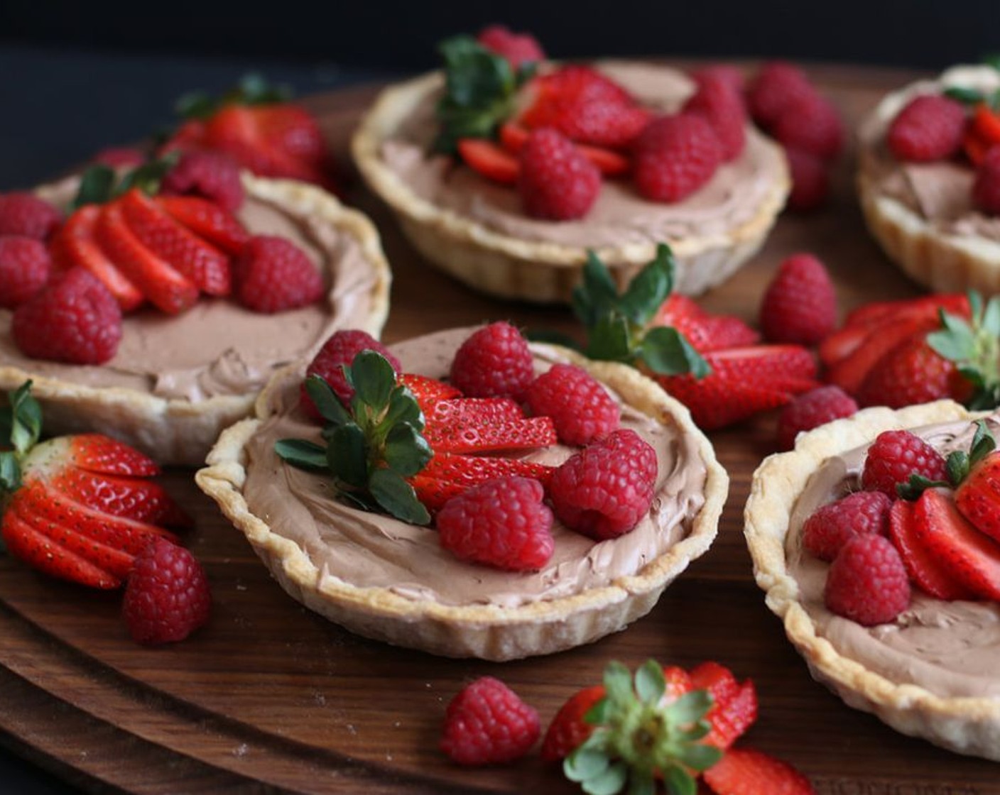 step 12 Garnish each tart with Fresh Strawberries (to taste) and Fresh Raspberries (to taste) right before serving.