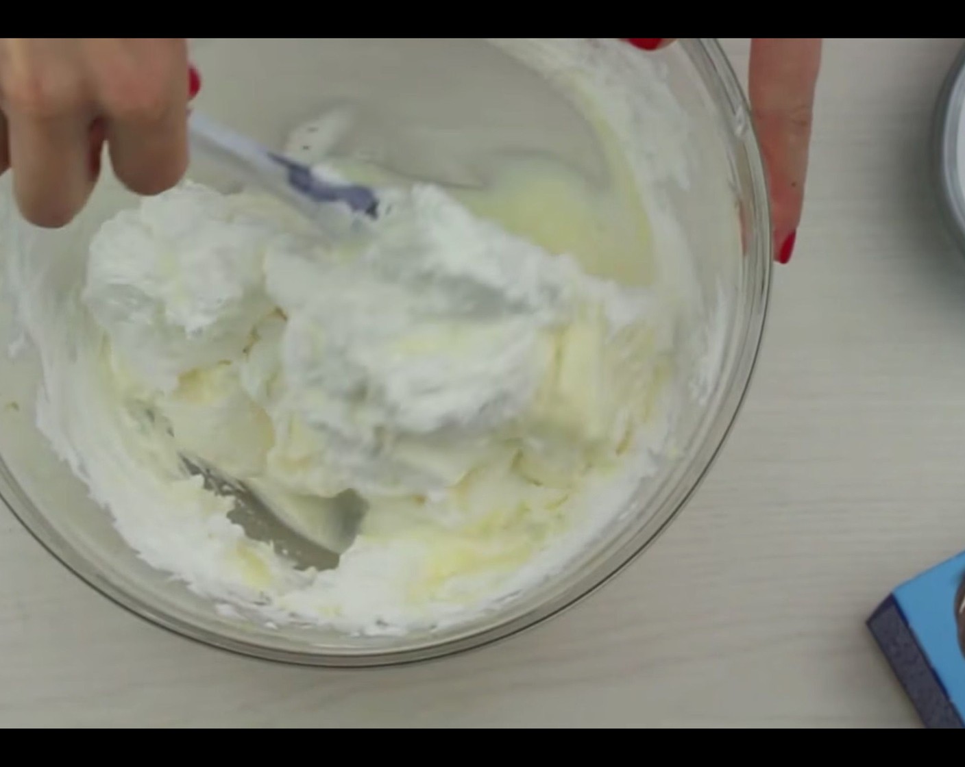 step 10 Add beaten heavy whipping cream and mix with spatula until well combined.