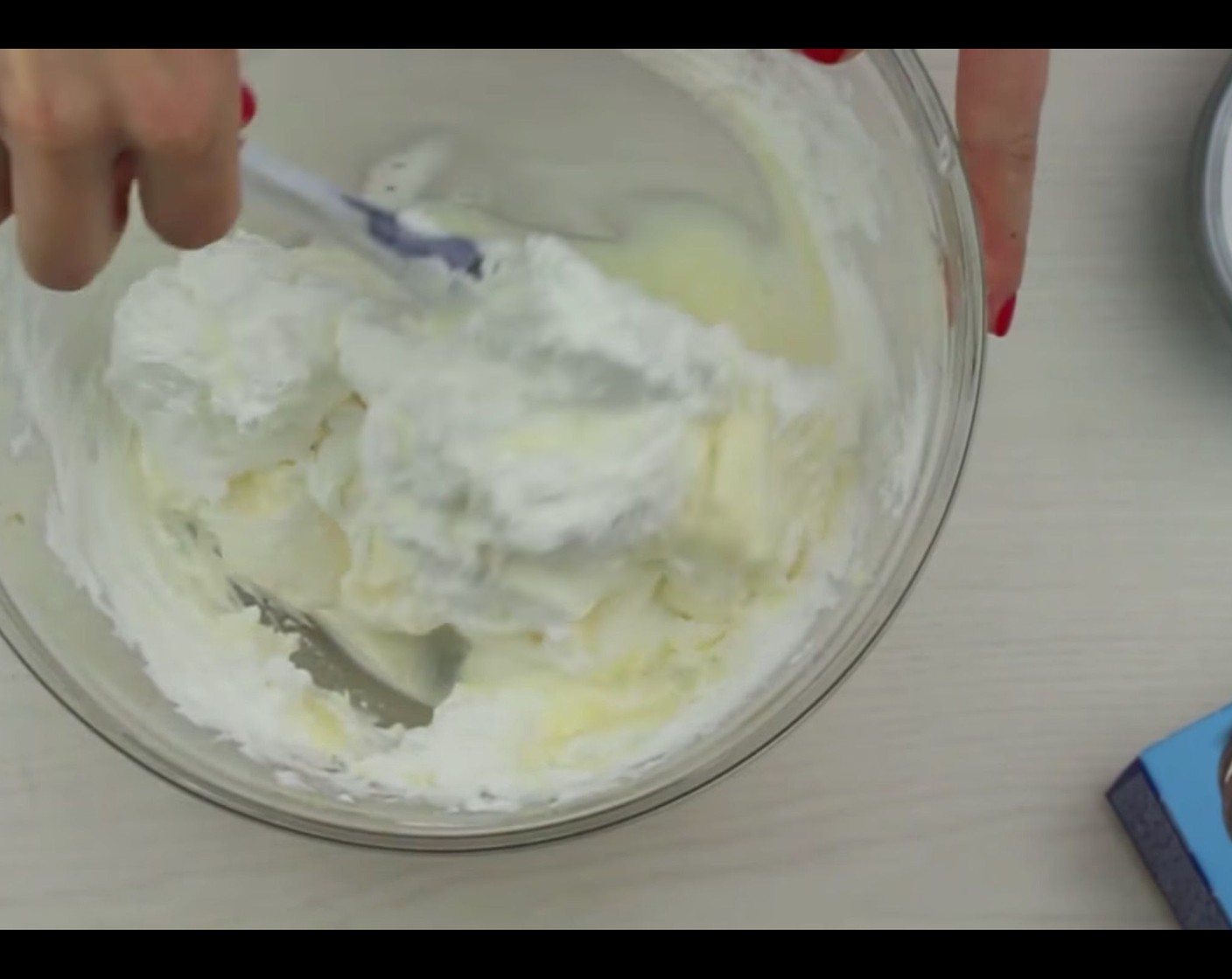 step 10 Add beaten heavy whipping cream and mix with spatula until well combined.