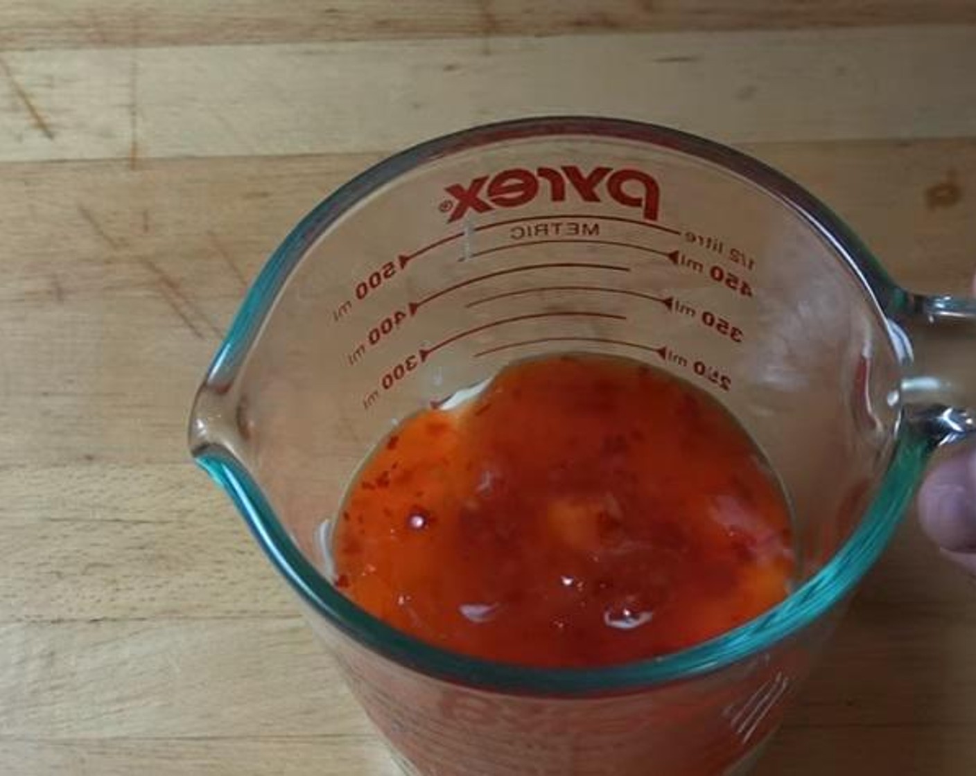 step 2 Into a little Jar, add your Sour Cream (4 Tbsp), Sweet Chili Sauce (4 Tbsp), and Mayonnaise (4 Tbsp).. Mix all together until Combined.