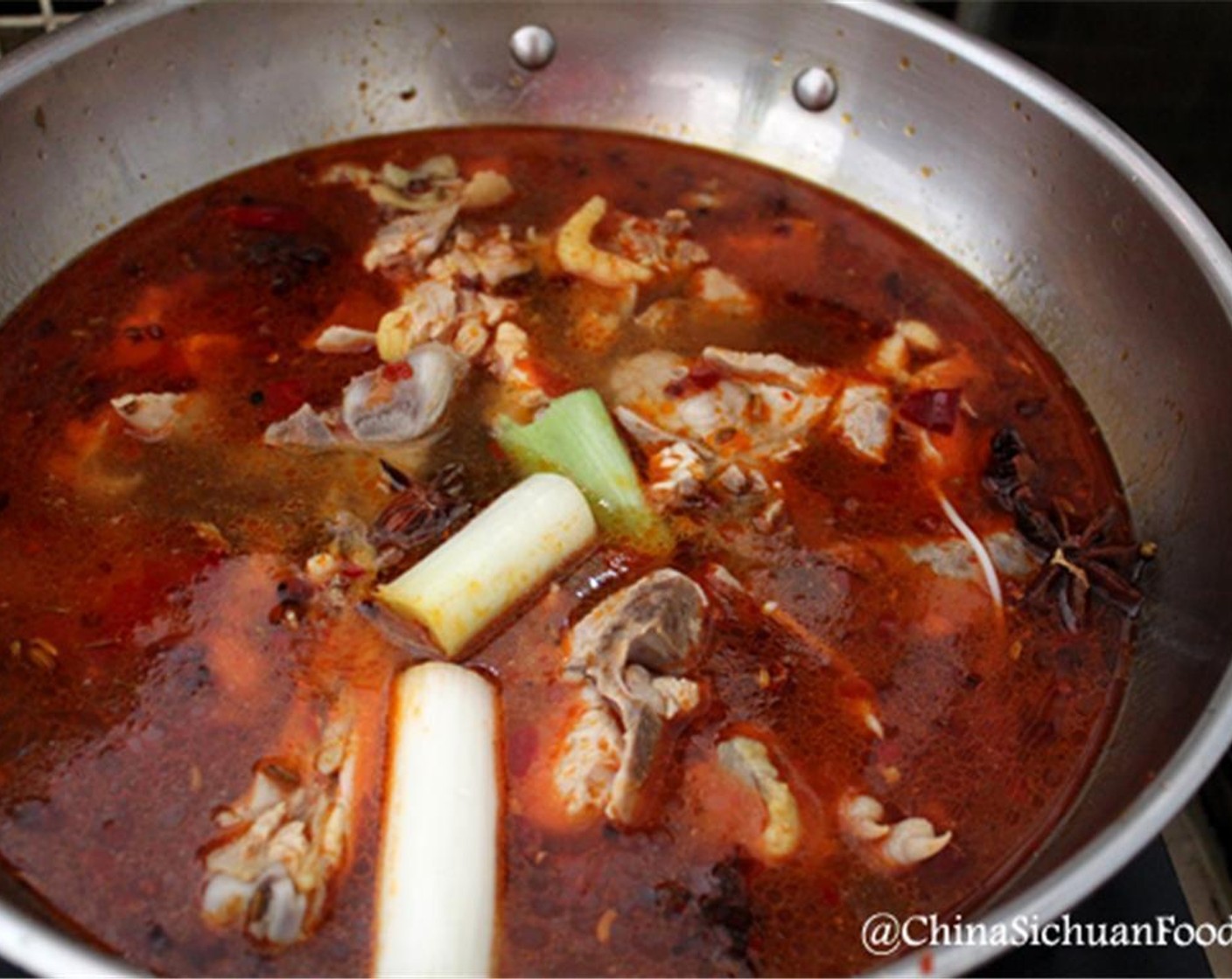 step 5 Add stock to the spices. Add Salt (1/2 Tbsp) and simmer for 20 minutes.