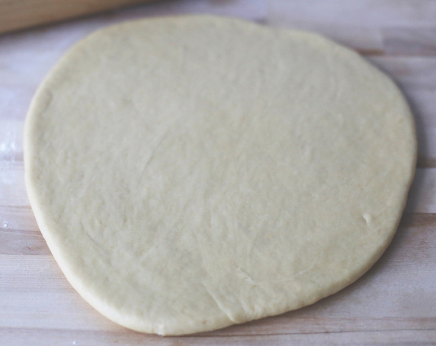 step 12 Roll out the dough until it's about 1.5-cm or 1/2-inch thick.