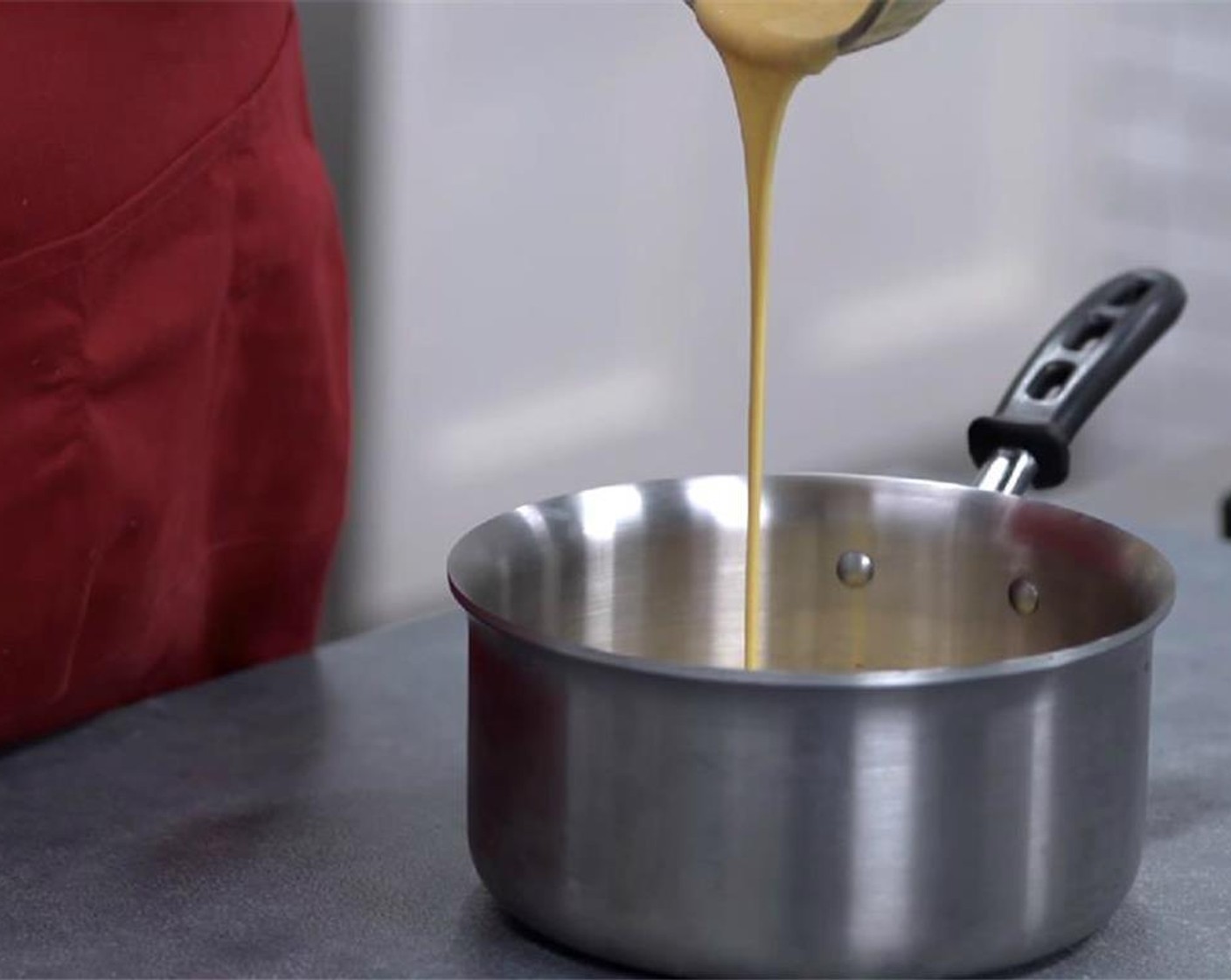 step 5 Add the flour mixture into the melted chocolate and whisk together.