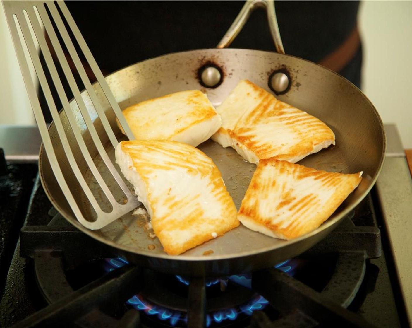 step 15 Heat Olive Oil (1 tsp) in a medium saute pan over medium high heat. Season each piece of fish with a pinch of salt on each side. Sear fish on one side for three minutes until golden brown.