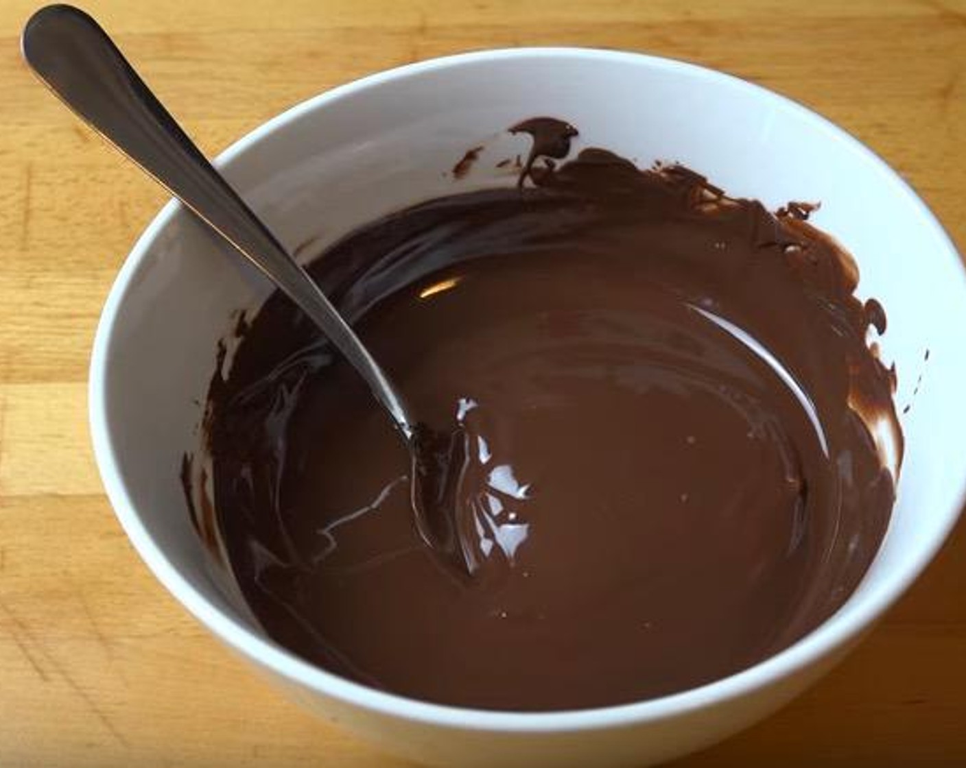 step 2 Place Semi-Sweet Dark Chocolate (1 3/4 cups) in a microwave-safe dish and heat for 30 seconds. Stir and repeat until the chocolate is melted and smooth. Set aside to cool.