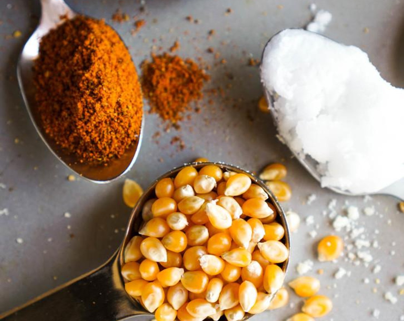 step 1 Melt the Coconut Oil (1 Tbsp) in a small pot over medium heat. Add the Popcorn Kernels (3 Tbsp).