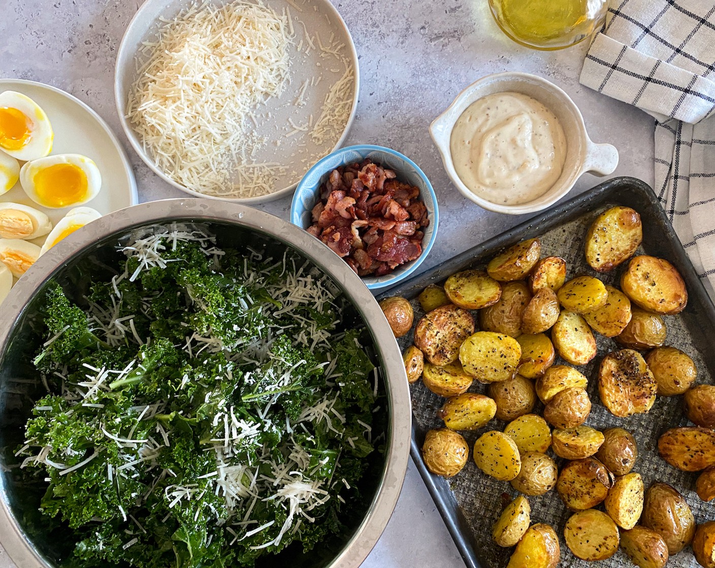 step 9 Peel and slice the eggs into halves or wedges. Toss most of the Grated Parmesan Cheese (3/4 cup) as well as lemon zest with the kale.