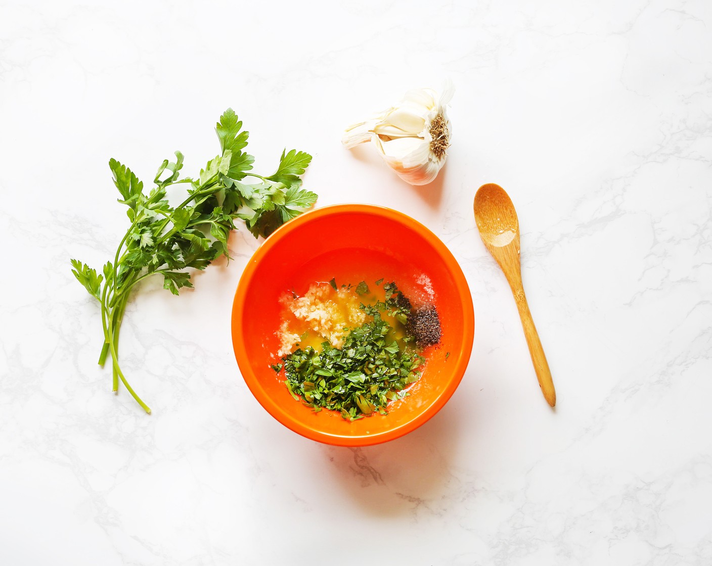 step 2 In a small bowl, combine the Butter (1/3 cup), Garlic (4 cloves), Italian Flat-Leaf Parsley (1/4 cup), Salt (1/2 tsp), and Ground Black Pepper (1/2 tsp). Mix well and set aside.