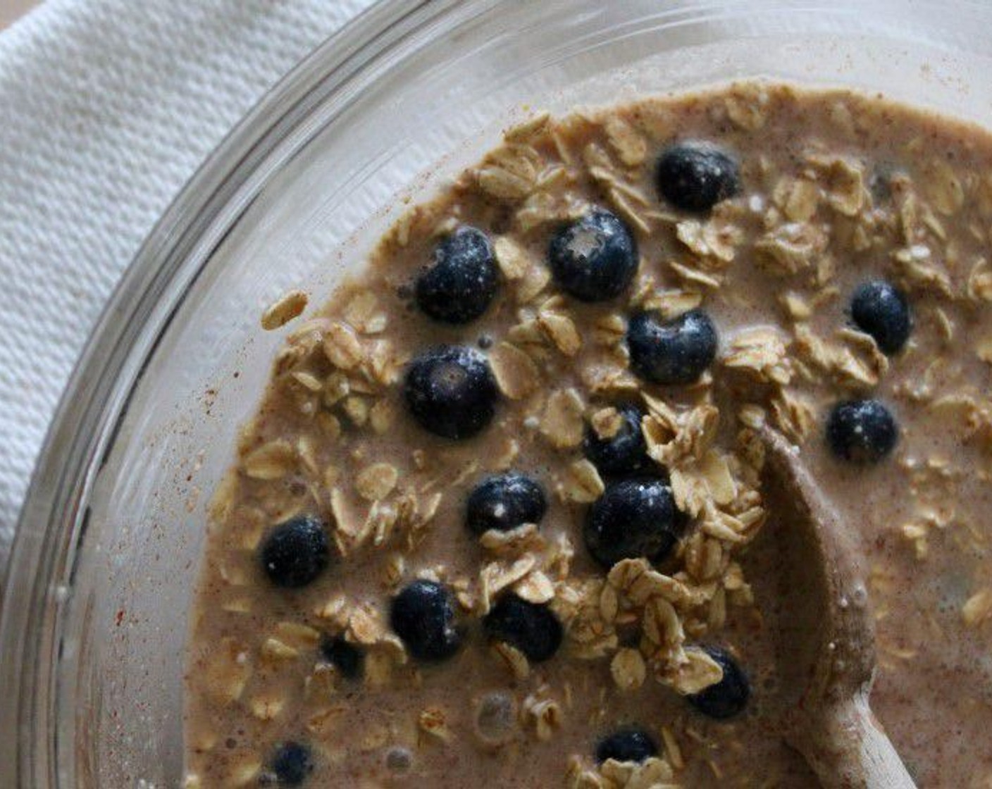 step 5 Add the dry ingredients to the wet ingredients and stir until combined. Gently stir in the Fresh Blueberry (1 cup) pour into the prepared pan, and top with the almond and coconut mixture.