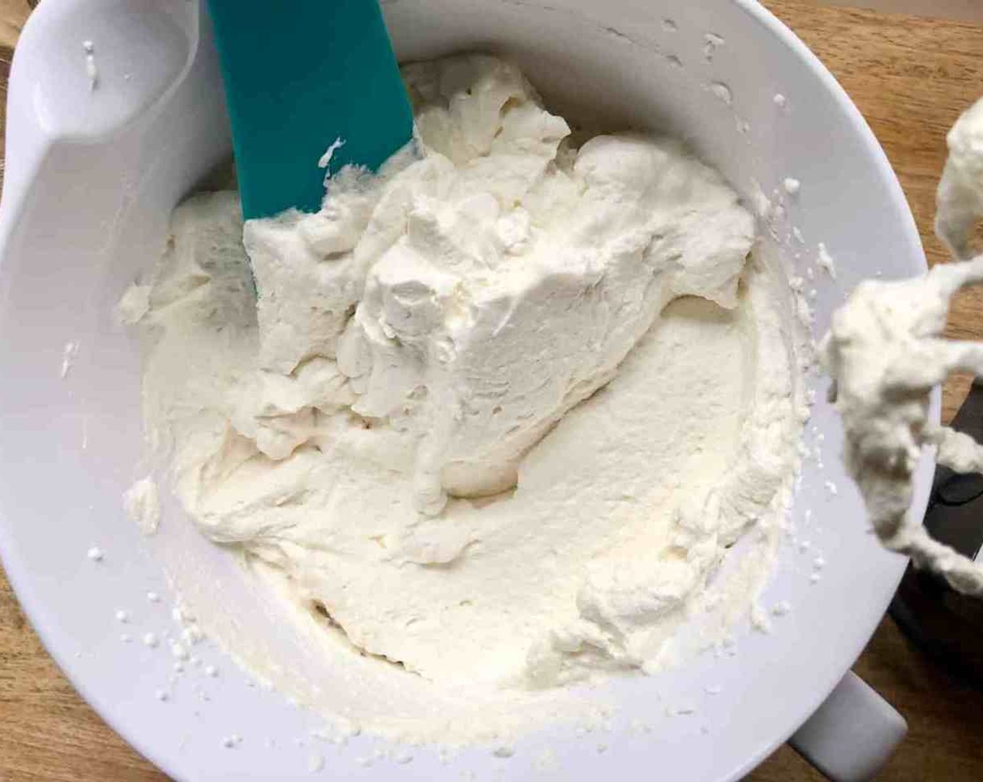 step 12 Meanwhile, prepare the whipped cream topping. Using a hand mixer or a stand mixer fitted with a whisk attachment, whip the Whipped Cream (2 cups), Granulated Sugar (4 Tbsp), and Pure Vanilla Extract (1 tsp) on medium-high speed until medium peaks form, about 3-4 minutes.